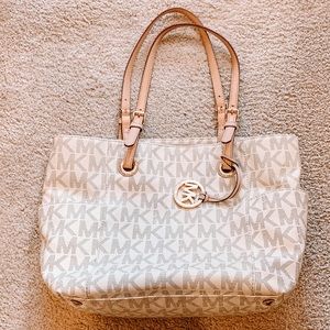 Micheal Kors cream and tan leather tote